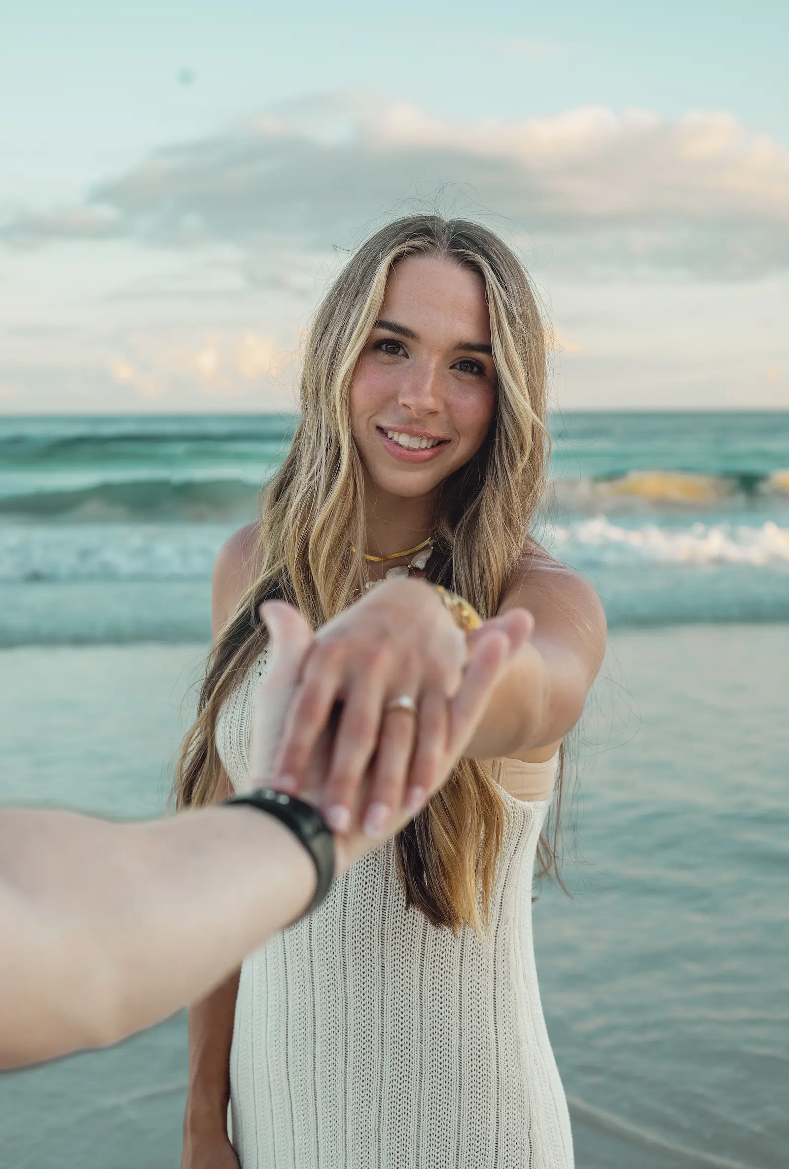 Romantic proposal photographer in Tulum capturing golden hour engagement moment naturally