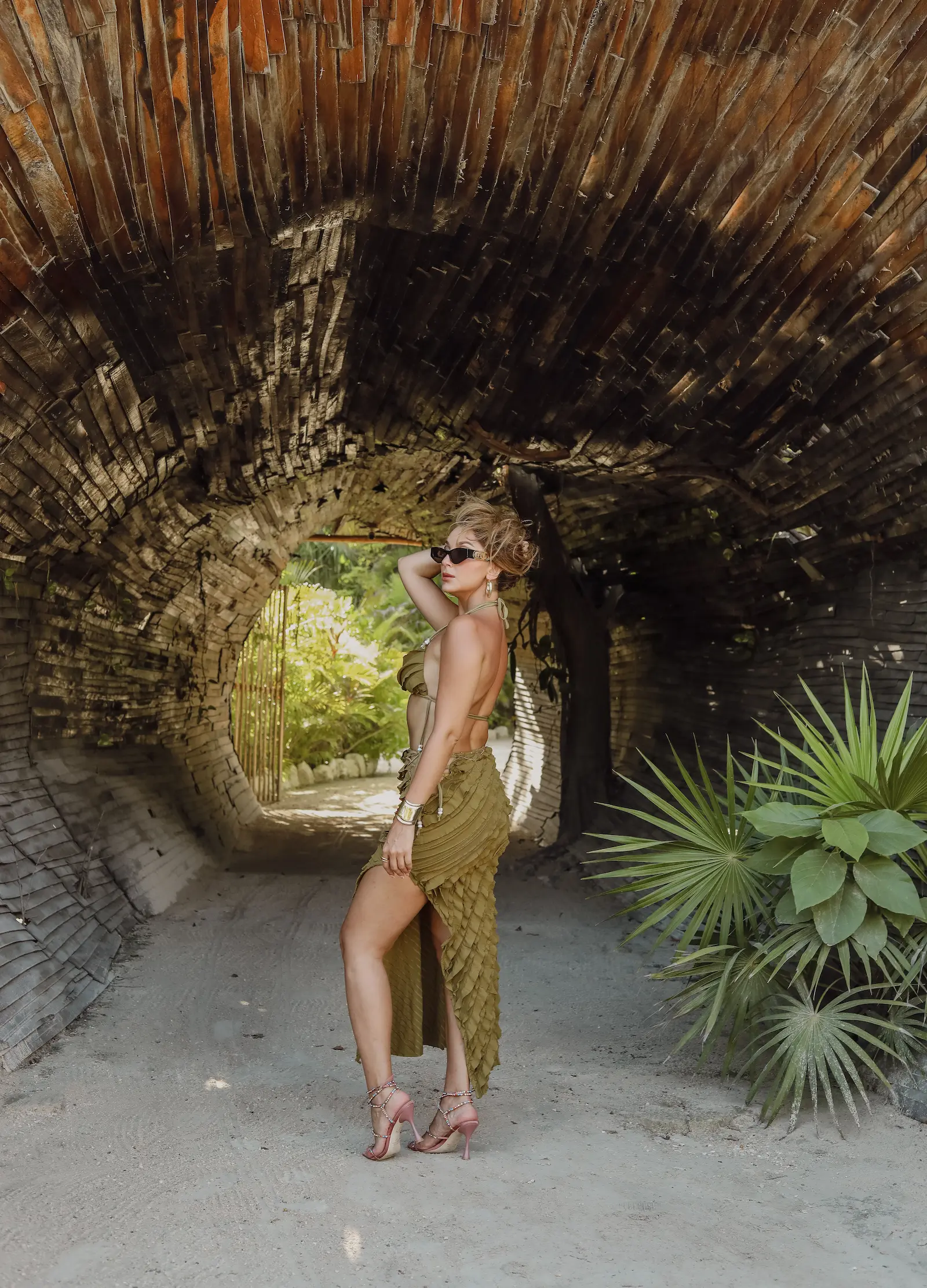 Elegant solo portrait with warm sunset tones captured by professional Tulum photographer